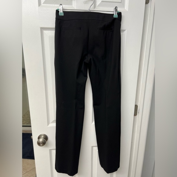 Anne Klein black boot-cut mid-rise dress pants, button and zipper closure. - Picture 2 of 4